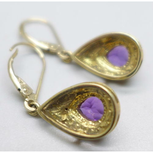 1083 - A pair of 9ct gold and amethyst earrings, 4.2g