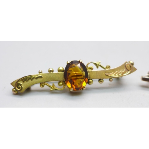 1084 - Two 9ct gold brooches; one set with a citrine and dated Birmingham 1901 and one set with an opal, to... 