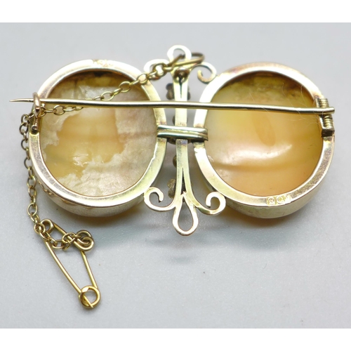 1085 - A 9ct gold double cameo brooch, 7.6g