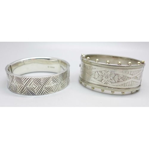 1091 - A 1960's hallmarked silver bangle, Birmingham 1964, 29g, and one other bangle marked 'silver band', ... 