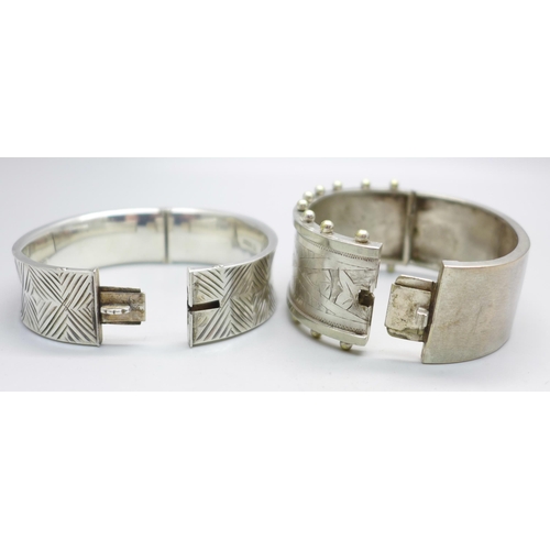 1091 - A 1960's hallmarked silver bangle, Birmingham 1964, 29g, and one other bangle marked 'silver band', ... 