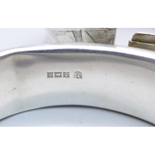 1091 - A 1960's hallmarked silver bangle, Birmingham 1964, 29g, and one other bangle marked 'silver band', ... 