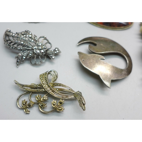 1099 - A collection of silver and white metal jewellery, (two brooches marked, all test as silver, large br... 