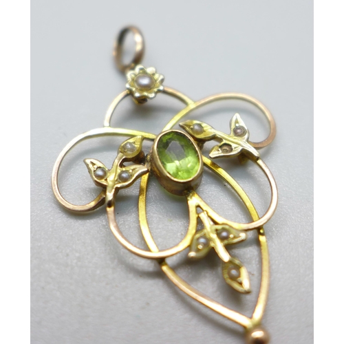 1102 - A 9ct gold and peridot pendant, 2g