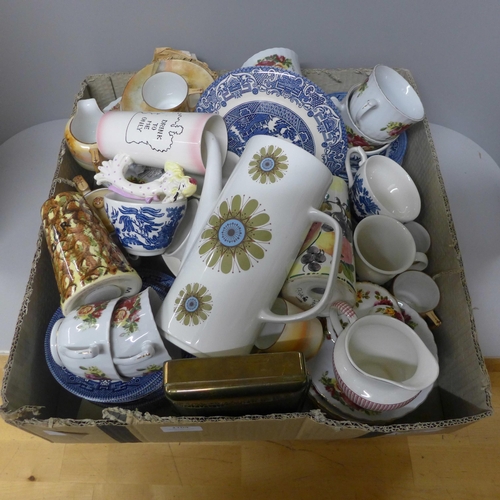 1104 - A collection of china, blue and white Willow pattern, two shakers, an oriental tea service, Royal No... 