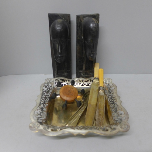 1109 - A Danish candle holder, a pair of carved African busts, silver plated dish and flatware **PLEASE NOT... 