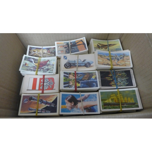 1112 - A box of cigarette cards, 32 sets, over 1100 cards **PLEASE NOTE THIS LOT IS NOT ELIGIBLE FOR POSTIN... 