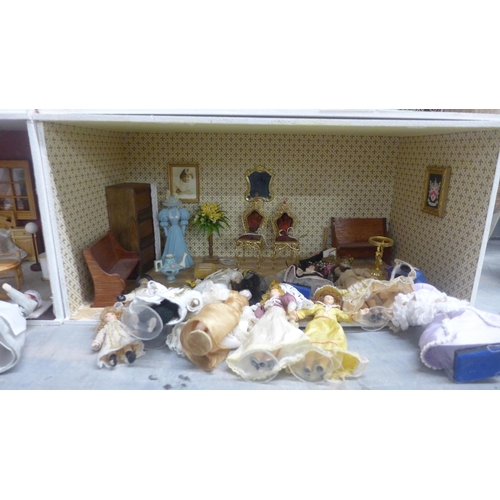 1120 - A six stacking doll's house display cabinet with dolls and dolls house furniture **PLEASE NOTE THIS ... 