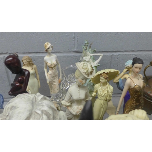 1123 - A collection of figures including carved African and Victorian style **PLEASE NOTE THIS LOT IS NOT E... 