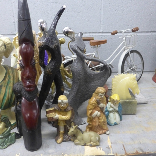 1123 - A collection of figures including carved African and Victorian style **PLEASE NOTE THIS LOT IS NOT E... 