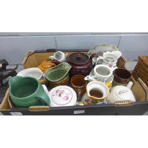 1129 - A box of mixed decorative china; teapots, mugs, tankards, etc. **PLEASE NOTE THIS LOT IS NOT ELIGIBL... 