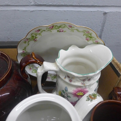 1129 - A box of mixed decorative china; teapots, mugs, tankards, etc. **PLEASE NOTE THIS LOT IS NOT ELIGIBL... 