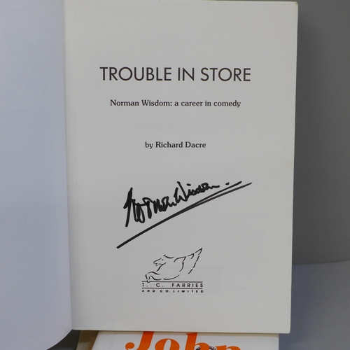 622 - Autographed comedy books, Ronnie Barker, John Cleese, Norman Wisdom and Spike Milligan (4)