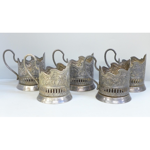 626 - Five Russian silver plated cup holders with decoration commemorating achievements in space explorati... 