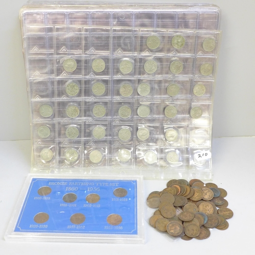 652 - A bag of approximately 90 farthings and a bronze farthing coin set, a collection of empty coin pages... 