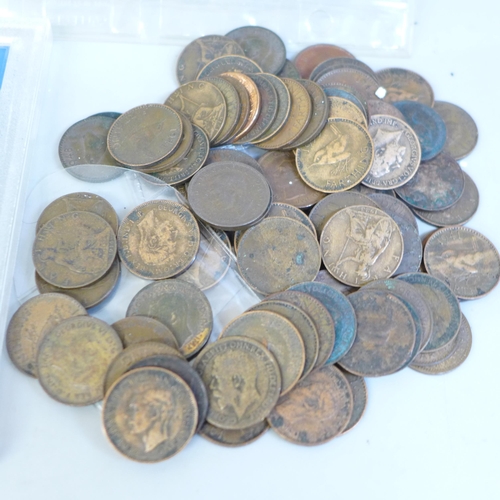 652 - A bag of approximately 90 farthings and a bronze farthing coin set, a collection of empty coin pages... 