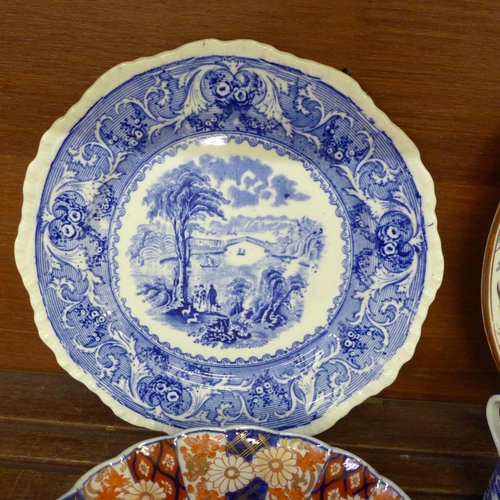 680 - An oriental charger and plate, blue and white china and a cranberry glass custard cup **PLEASE NOTE ... 