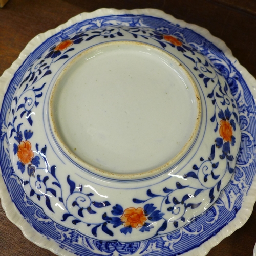 680 - An oriental charger and plate, blue and white china and a cranberry glass custard cup **PLEASE NOTE ... 