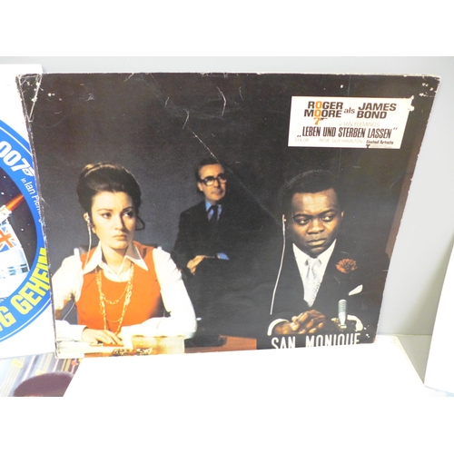 683 - James Bond promotional item; stickers for Moonraker, Octopussy and lobby cards, etc.