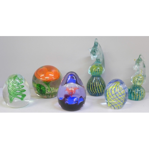 692 - Two M'dina glass paperweights, a Caithness glass paperweight and three others