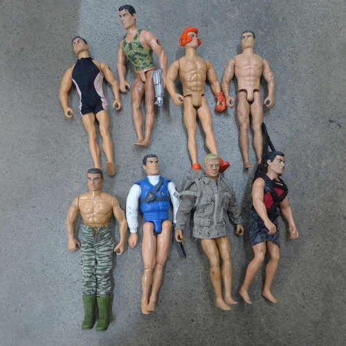 712 - A collection of twenty-one Action Man figures and villains, clothes and accessories