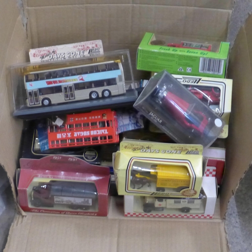 713 - A box of Lledo and Matchbox die-cast model vehicles