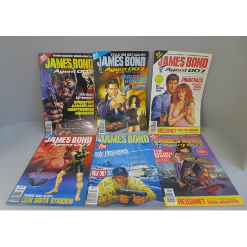 721 - A large selection of James Bond comics