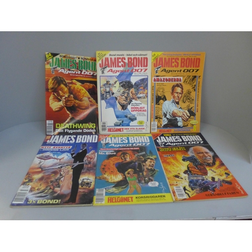 721 - A large selection of James Bond comics