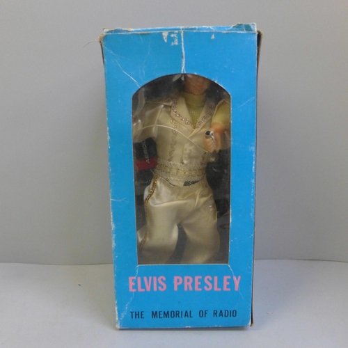 732 - An Elvis Presley boxed radio and a Wurzel Gummidge vintage doll with three detachable heads