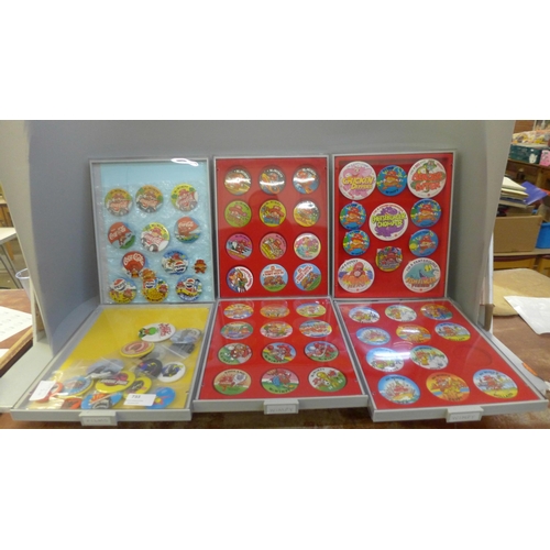 733 - A collection of Wimpy badges, film badges, all in display/collectors cases