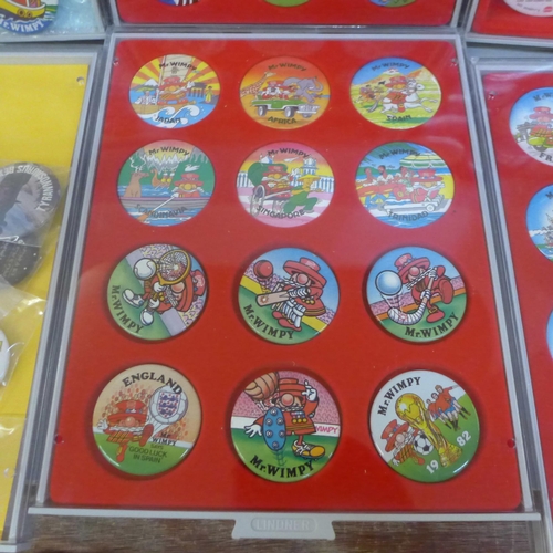 733 - A collection of Wimpy badges, film badges, all in display/collectors cases