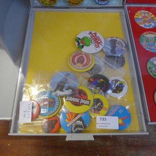 733 - A collection of Wimpy badges, film badges, all in display/collectors cases