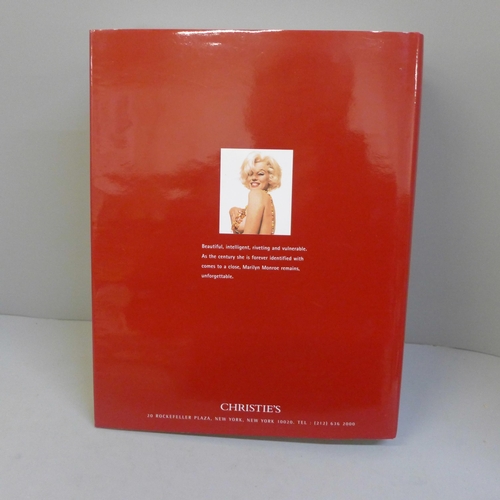 734 - A Christies of New York Marilyn Monroe auction book, 1999