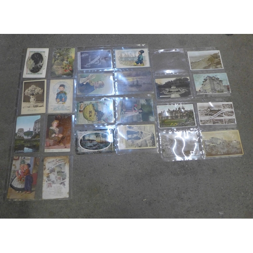 738 - A collection of approximately 160 postcards, many affected by damp