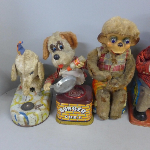 765 - Vintage tin-plate mechanical battery operated toys including Bar Tender, Elephant and Monkey Smoker