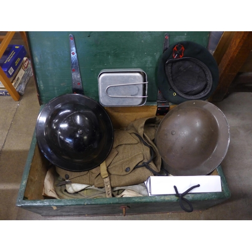 768 - A regimental pine travelling box to D. Staniforth; two helmets, mess tin, uniform, belts, badges, et... 