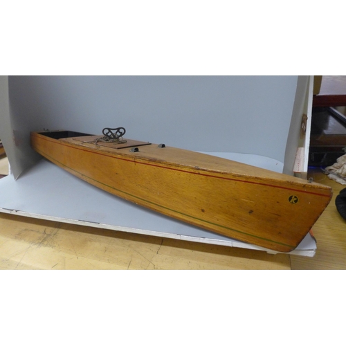 770 - A wooden pond boat with clockwork mechanism, 83cm