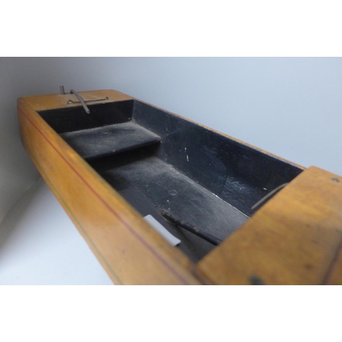 770 - A wooden pond boat with clockwork mechanism, 83cm