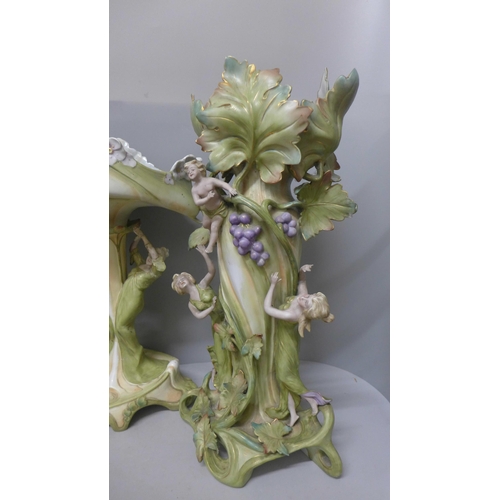 788 - A pair of tall German Art Nouveau figural vases and a tall figural pedestal dish, a/f (damage to fin... 