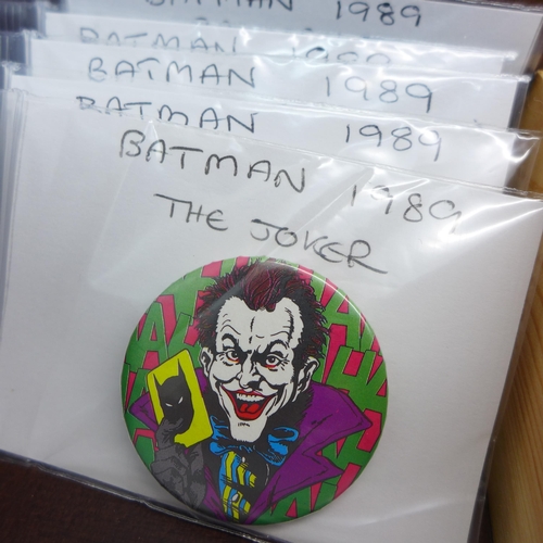 796 - A collection of over 80 vintage and later pin badges, Batman, James Bond and Discworld, sorted and d... 