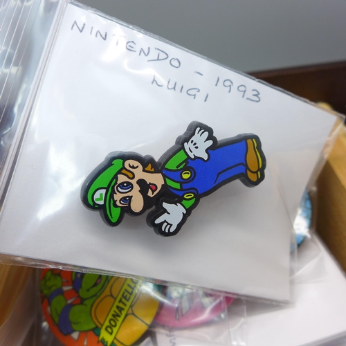 797 - A collection of approximately 90 vintage and later pin badges, early gaming, Sega Sonic the Hedgehog... 