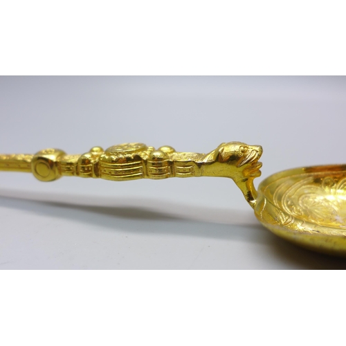 802 - A silver gilt anointing spoon, London 1901, Saunders & Shepherd, 102g, 25.5cm