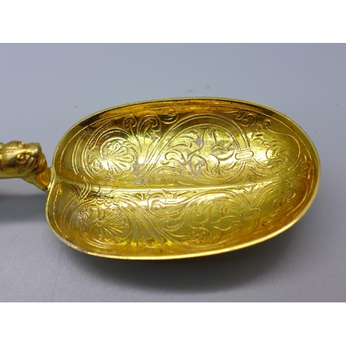 802 - A silver gilt anointing spoon, London 1901, Saunders & Shepherd, 102g, 25.5cm