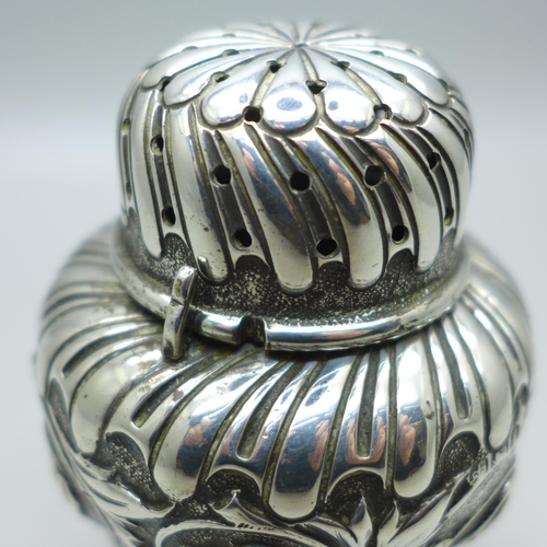 804 - A Walker & Hall embossed silver castor, Sheffield 1898, 106g, 9cm