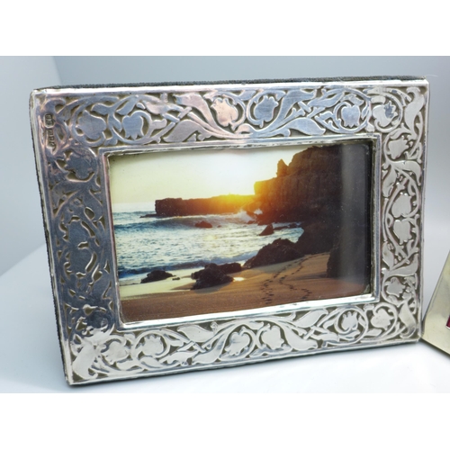 809 - Two silver photograph frames, larger frame 22cm x 17cm and dated Birmingham 1916