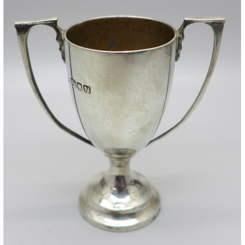 810 - A small silver two handled trophy, London 1948, 50g