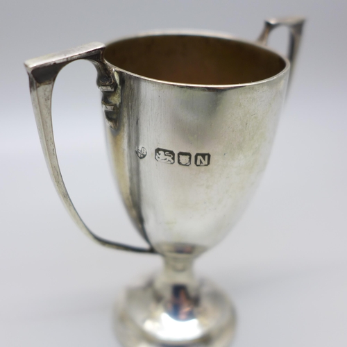 810 - A small silver two handled trophy, London 1948, 50g