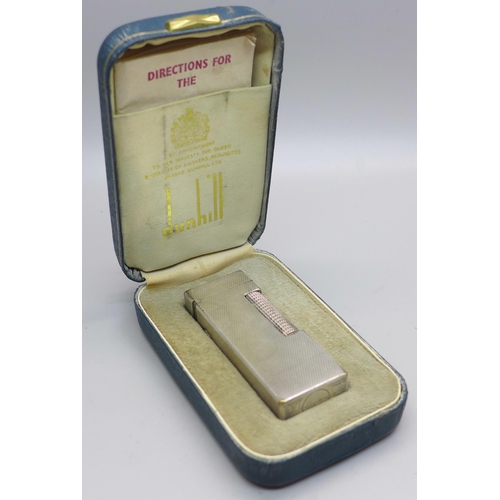 814 - A Dunhill lighter, cased