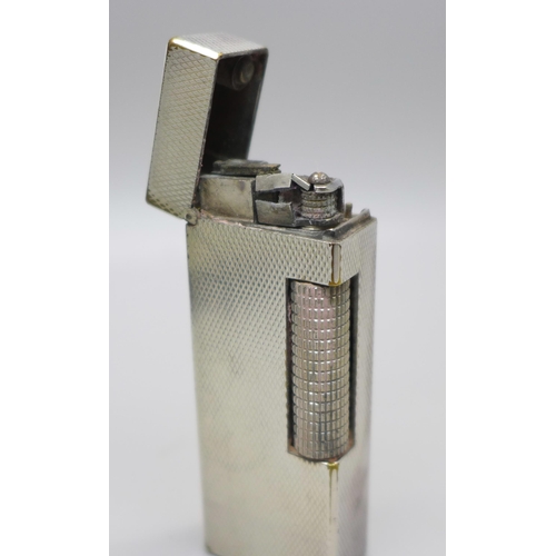 814 - A Dunhill lighter, cased