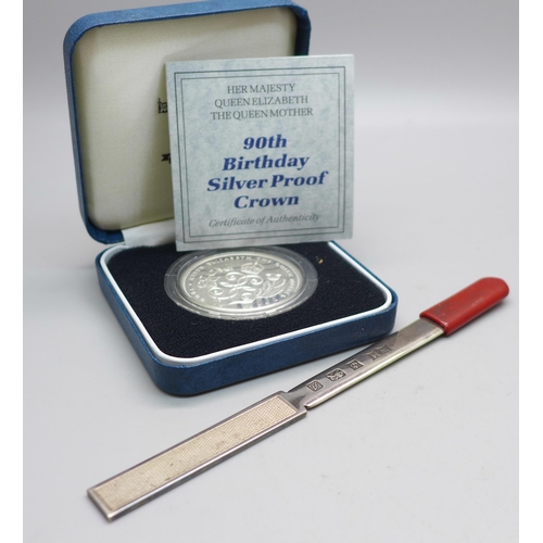 816 - A Queen Elizabeth The Queen Mother silver proof crown and a silver letter opener, 24g